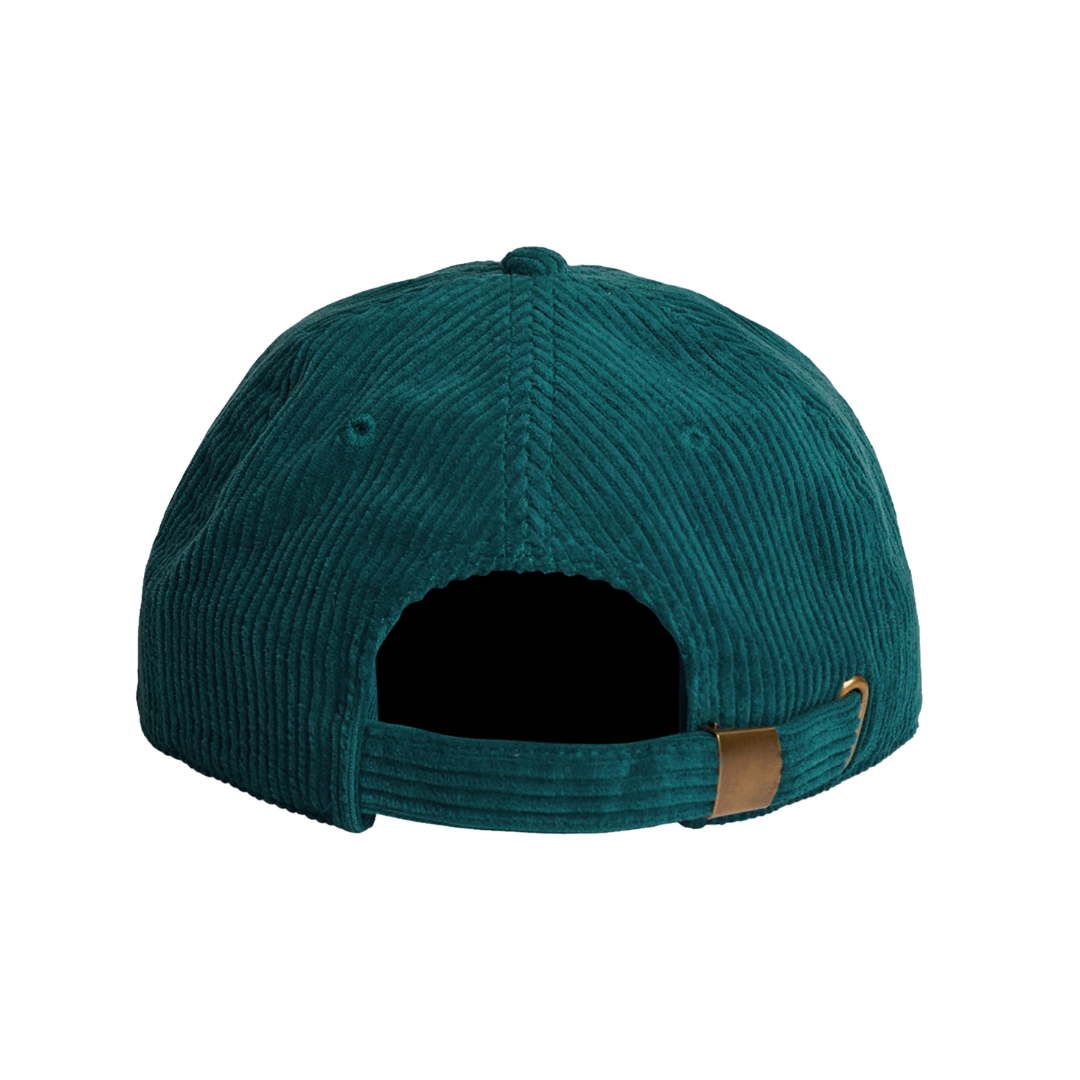 The back view of a dark teal corduroy baseball cap with an adjustable strap and a small gold metal hook.